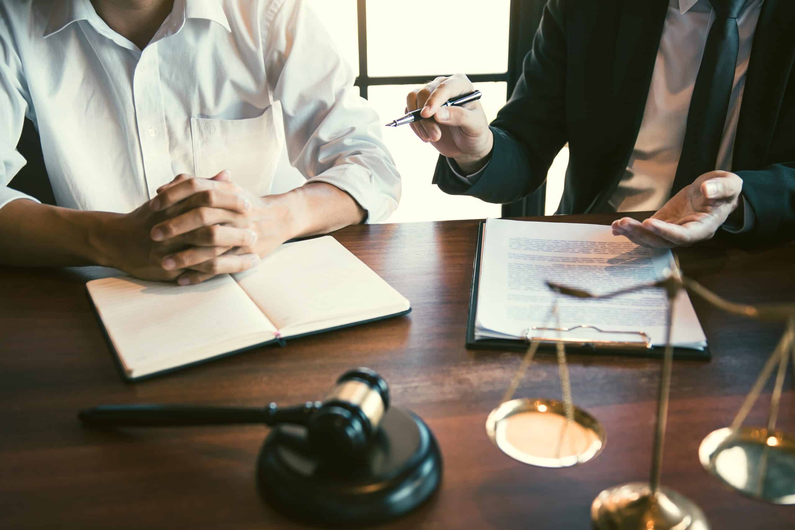 Lawyer explained to the client about the legal issues that must be taken in court in the office.